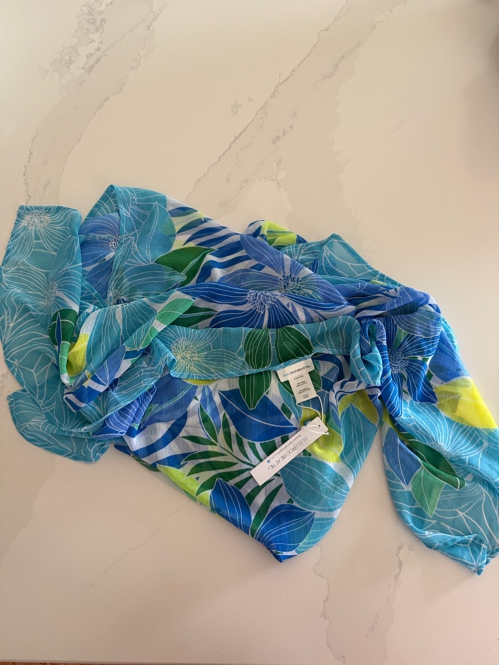 Blue Floral Sheer Scarf with Green Accents.  New with tag. One size.